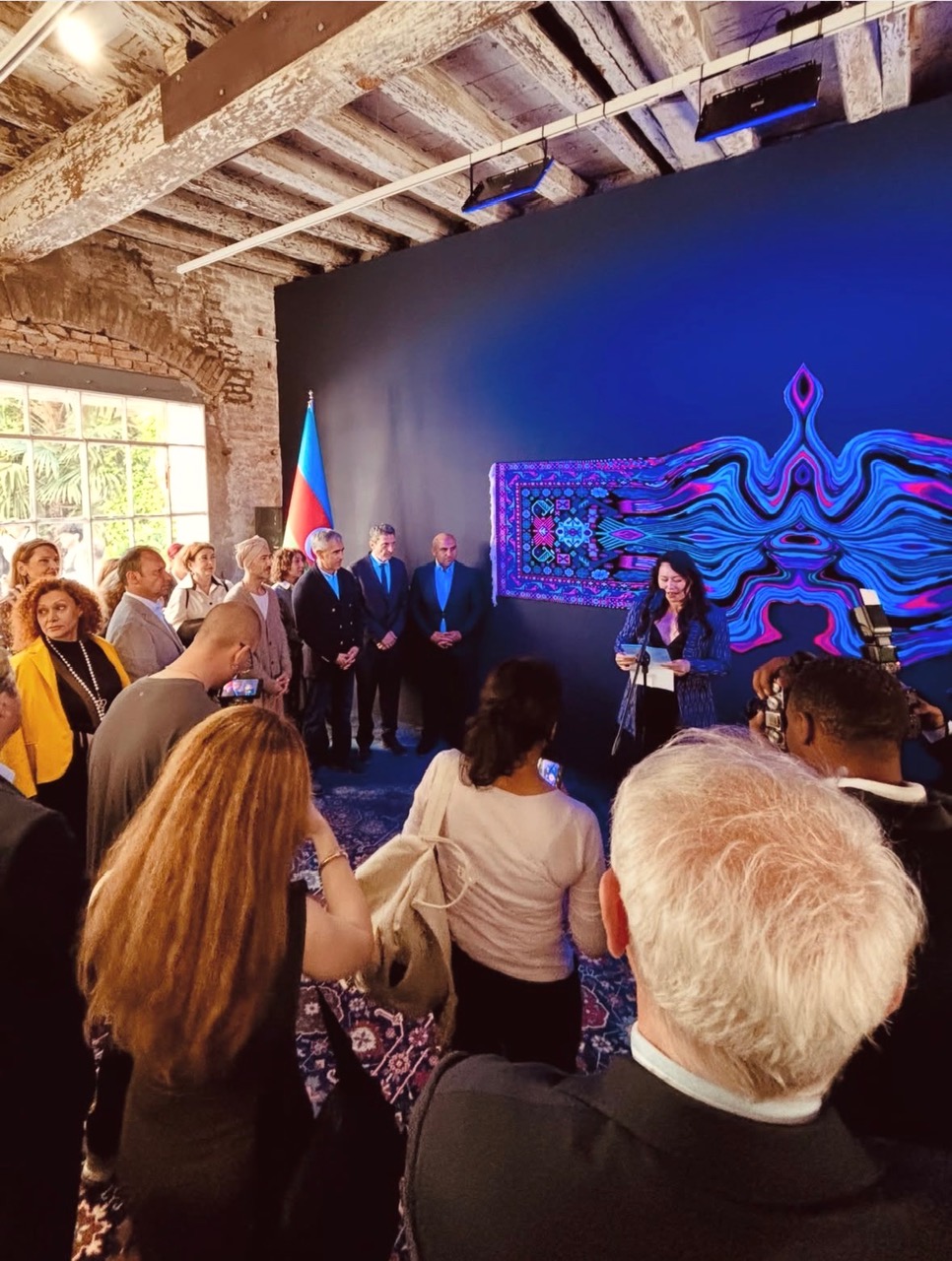Collaço speaking at podium