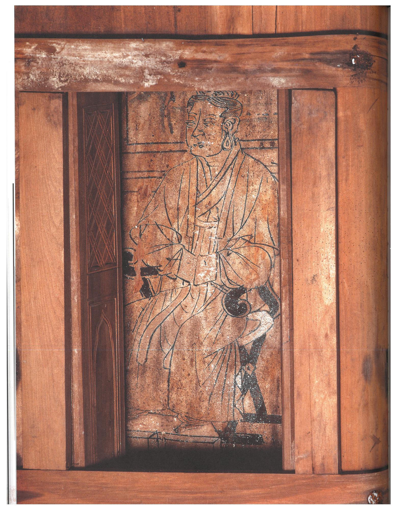 figure carved into wood