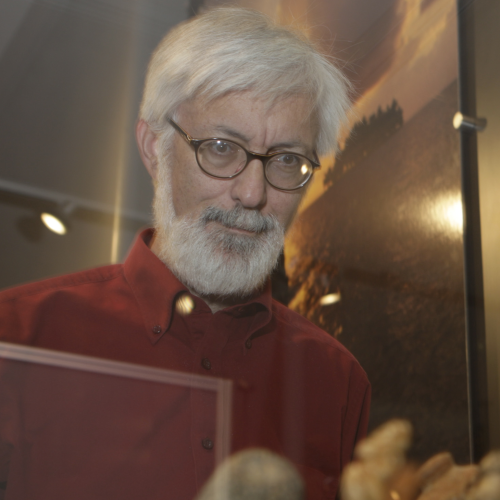 Steven Lubar examining a museum case