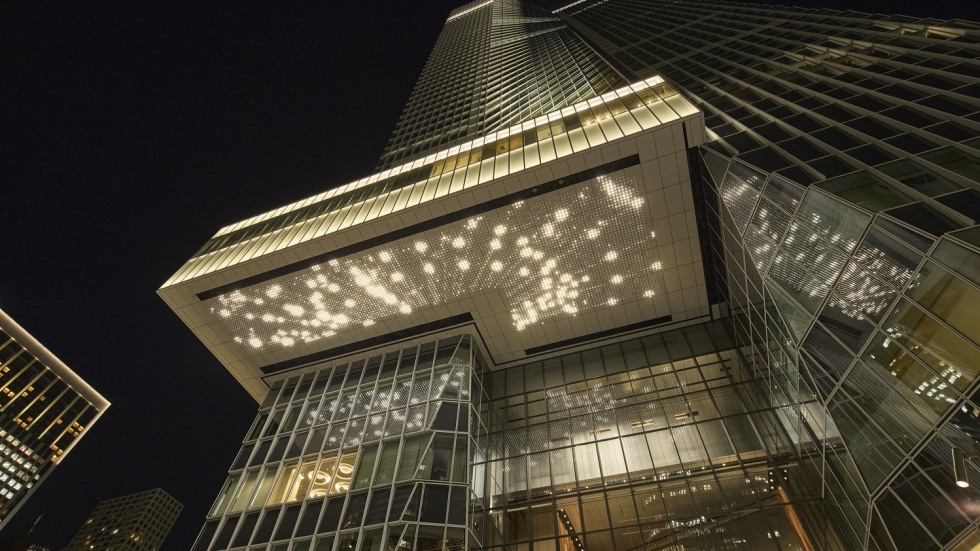 Image of building with light installation by Leo Villareal